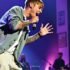 Justin Bieber performing passionately on stage